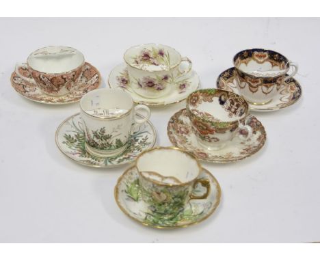 A collection of six late 19th / early 20th Staffordshire china moustache cup and saucers to include: Royal Albert pattern no: