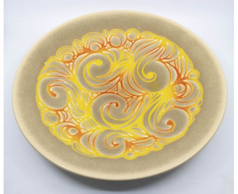 Poole Pottery: A Poole Pottery Aegean charger with red and orange abstract decoration. Diameter approx 41cm. Marks to the bas