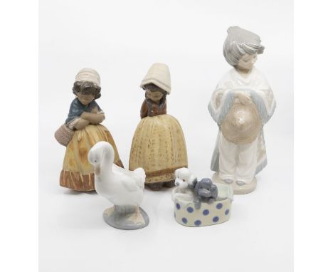 Two Lladro figures of girls along with three Nao figures