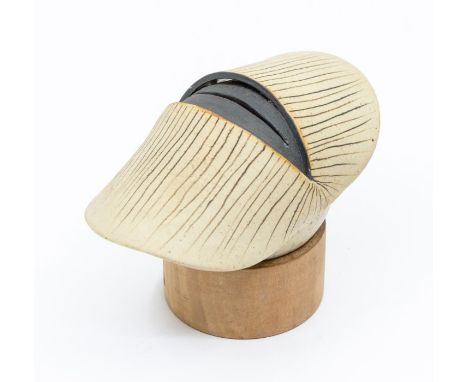 Studio pottery ceramic abstract form cream ground with black decoration and black to centre section. Height approx 6cm, width