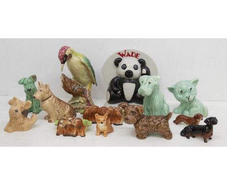 A collection of Beswick, Goebel, and Sylvac animals, with a Wade Collectors display sign