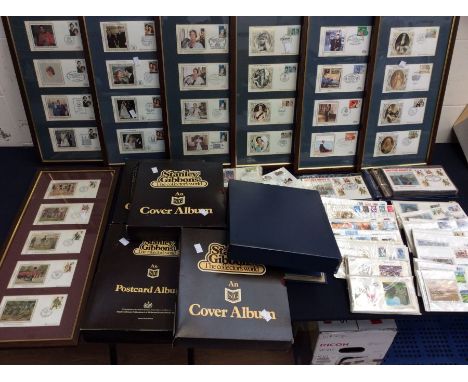 A collection of first day covers in 7 albums, 7 picture frames and loose plus 2 empty frames.