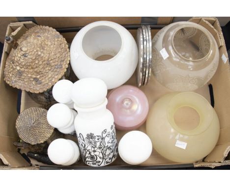 A collection of glass shades, early 20th Century 1960's kitchen containers, plated coasters and tea light cottages, along wit