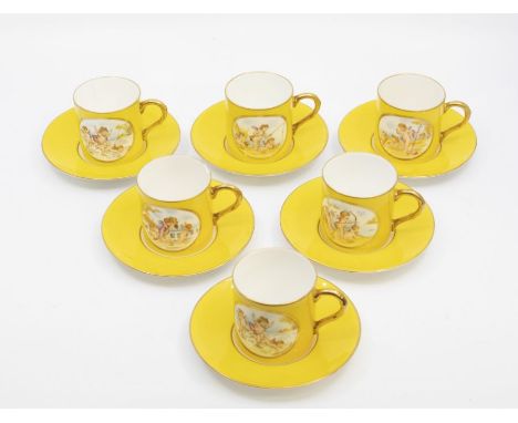 Six Royal Worcester coffee cans and saucers, in bold yellow hand painted with putti. Damage to one coffee can.
