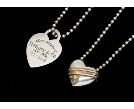 A vintage silver Tiffany &amp; Co silver and 18ct gold cupid arrow heart, diameter approx 17mm, marked 1994 Tiffany &amp; Co 