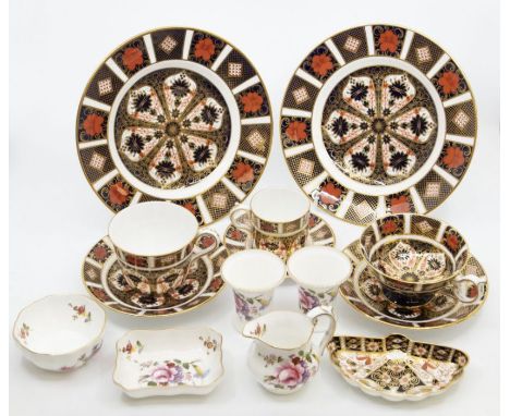 Two Royal Crown Derby 1128 Imari pattern medium dinner plates, first quality, tea cup and saucer first quality, coffee can an