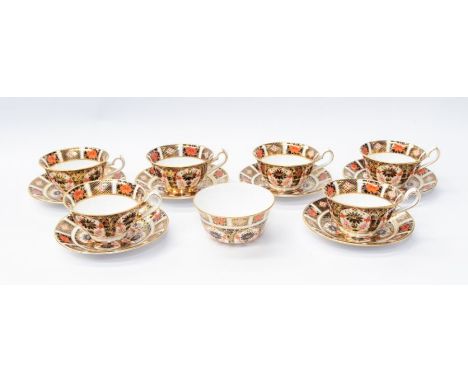 Six Royal Crown Derby 1128 Imari pattern tea cups, saucers with matching sugar bowl, all first quality