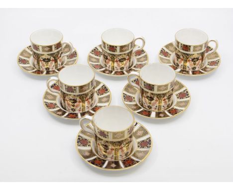 A collection of six Royal Crown Derby 1128 Imari pattern coffee cans and saucers, first quality