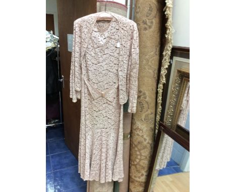 A coffee coloured 1930's lace dress and matching bolero/jacket, the dress is on the bias, v neck and the back of dress has a 