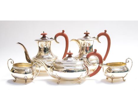 A Georgian style five piece tea and coffee set comprising coffee pot, teapot, water pot, sugar bowl and milk jug, the plain b