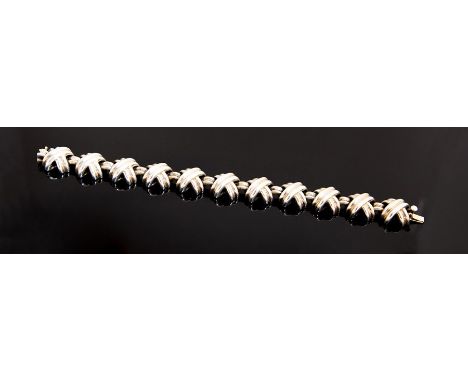 Tiffany & Co- A Tiffany & Co silver bracelet, from the Signature X collection, comprising polished cross shaped links with al