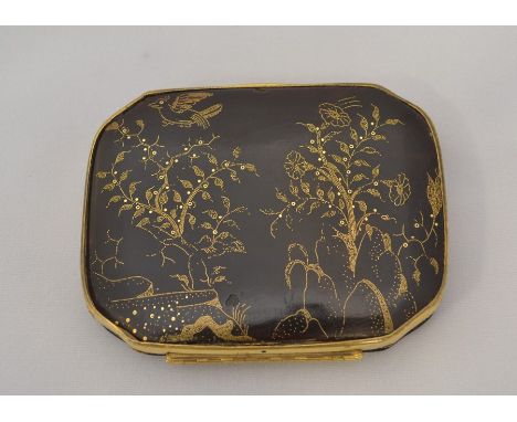 A 19th Century tortoiseshell and gold pique work gilt metal mounted rectangular snuff box with canted corners, the cover deco