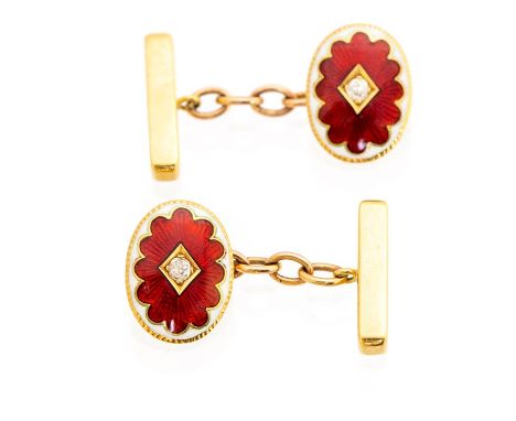 A pair of 18ct gold and enamel cufflinks, comprising oval forms decorated with red guilloche enamel with white enamel border,