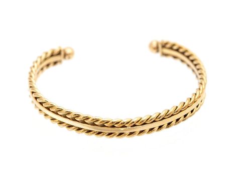 A 9ct gold torque bangle, comprising two rope twist rows either side of a flat central row with ball terminals, width approx.