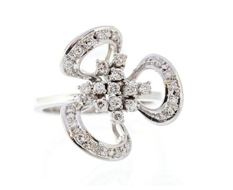 A diamond stylised three-leaf clover cluster ring, small round brilliant and round eight-cut diamonds, total diamond weight a