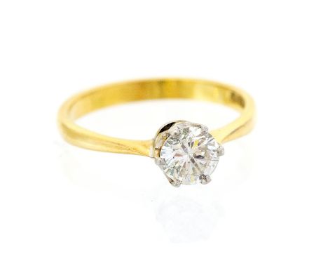 A diamond and 18ct yellow gold solitaire ring, round brilliant-cut diamond weighing approx 0.65ct, platinum coronet setting w