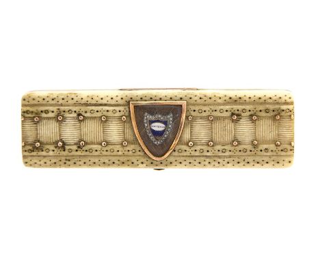 An early 19th century ivory toothpick/needle case, the centre set with an enamel shield inscribed 'Souvenir' with diamond set