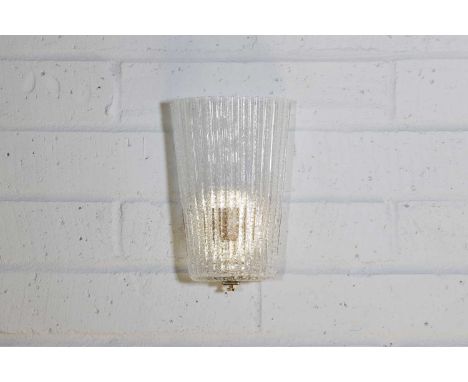 A Barovier & Toso 'Model No. 5500' wall sconce, modern, the textured ribbed glass shade of flared form, with gilt mounts,20cm