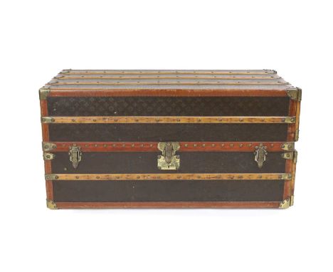 A Louis Vuitton monogrammed canvas wardrobe trunk, early 20th century, with ash banding, leather edging and detail, brass-ton