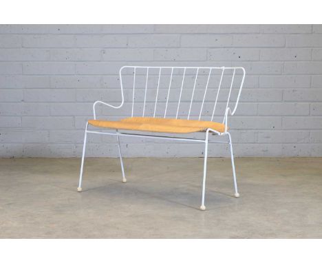 An 'Antelope' bench, modern, originally designed in 1950 by Ernest Race for 'The Festival of Britain', manufactured by Race F