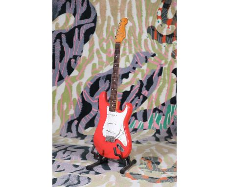 A 1996 Fender 'American Vintage Reissue' '62 Stratocaster electric guitar, serial number 'V****36', of typical form in a Fies