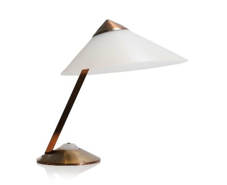A German brass and copper desk lamp, 1960s, manufactured by HELO Leuchten, with a conical textured plastic shade, raised on a