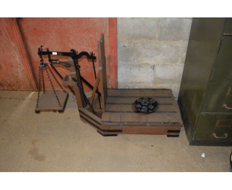An old set of French wooden grape scales with weights 
