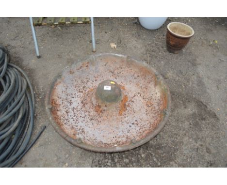 A cast iron pig trough 