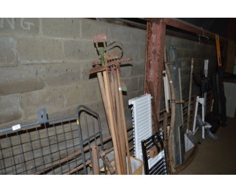 A quantity of long handled gardening tools 