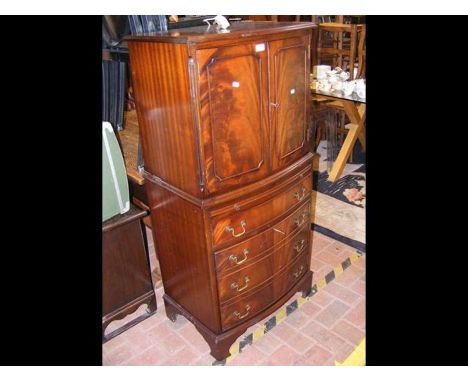 A reproduction bow fronted drinks cabinet CONDITION REPORTsome scratches on pull out shelf as per imagesCondition disclaimerO