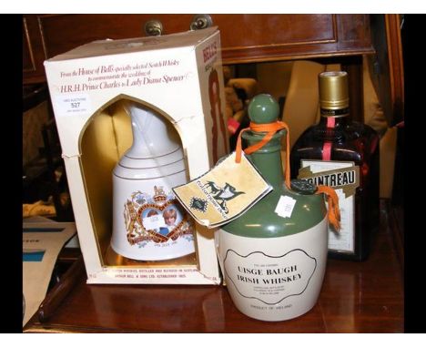 A commemorative bottle of Bell's Scotch Whisky, together with Uisge Baugh Irish Whiskey and Cointreau 