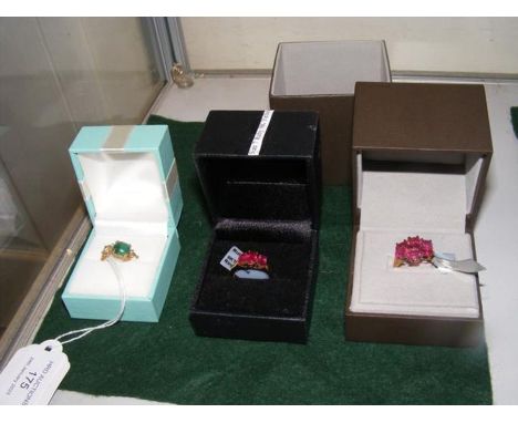 A 9ct ruby dress ring together with two others