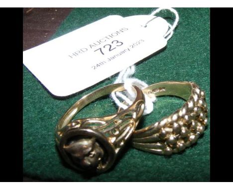 A gold signet ring and one other