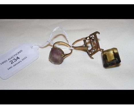 A 9ct smoky quartz dress ring and one other