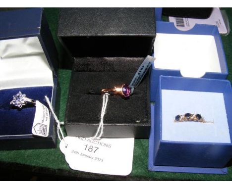 A 9ct gold dress ring together with two other dress rings