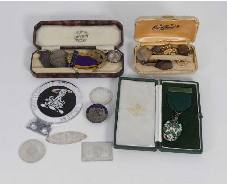 A collection of various silver and enamel badges and medallions, to include a fine quality silver and enamel medallion bearin