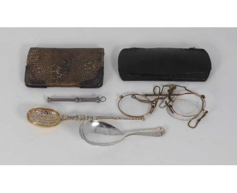 A George V silver caddy spoon, Sheffield 1928, 0.5ozt, together with another spoon, propelling pen, silver clad snakeskin pur
