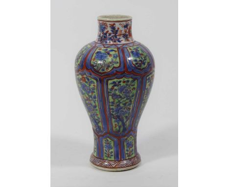 A Chinese blue and white export porcelain vase, of baluster form, having later Dutch clobbered enamel decoration, red pseudo 
