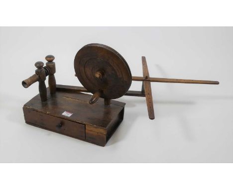 An oak and pine lace-making bobbin winder, h.32cm 