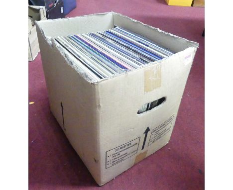 A collection of vintage LPs to include The Beach Boys and Kenny Rogers