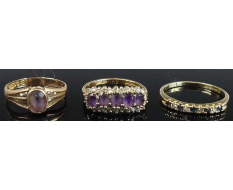 A 9ct gold amethyst set dress ring, size L; together with a modern 9ct gold amethyst and diamond point half-hoop ring, size M