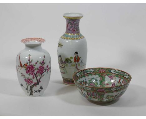 A Chinese Canton porcelain bowl, enamel decorated with panels of figures, dia.23cm; together with two Chinese porcelain vases