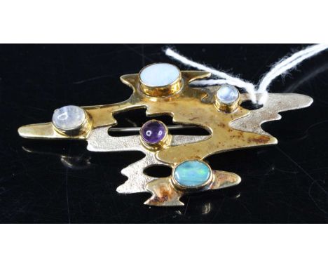 A contemporary silver-gilt cabochon amethyst, moonstone and opal set abstract brooch, 6cm 