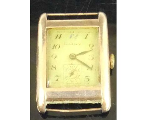 An Art Deco Dominex gent's 9ct gold cased tank watch, having manual wind movement (overwound and dial badly discoloured), gro