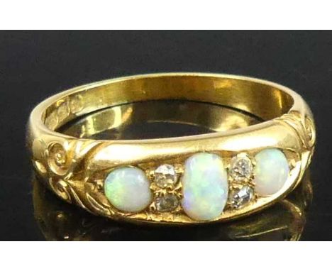 A late Victorian 18ct gold opal and diamond set band ring, 5g, sponsor HW Ltd, Birmingham 1897, size R
