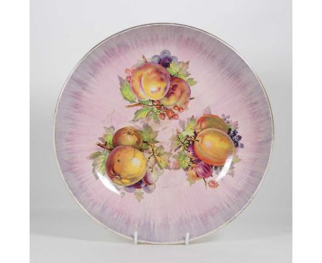 A Clarice Cliff Royal Staffordshire Pottery table bowl, decorated with fruit, dia.29cm