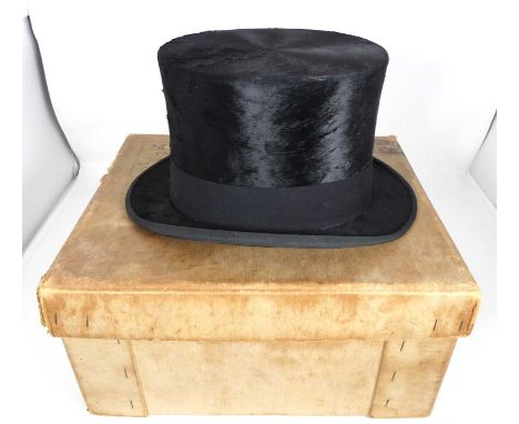 A vintage Scott's moleskin top-hat, boxedInterior 20 x 16cm, exterior 30.4 x 24.5cm.Wear and light losses to top edged extrem