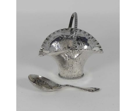 A George V silver caddy spoon, the bowl repoussee decorated with a courting couple, together with a repoussee decorated silve