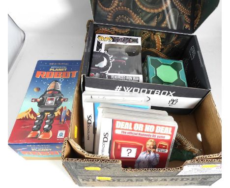 A collection of Nintendo DS games, a reproduction tinplate model robot etc 