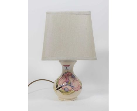 A Moorcroft Hibiscus pattern table lamp with shade, total h.35cm